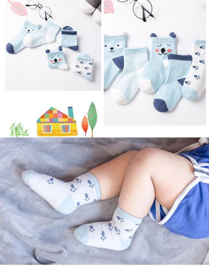 赤ん坊はかわいい有機性赤ん坊が狂気のおかしい綿の新生の綿の注文の女の赤ちゃんのソックスを強打する有機性綿のスリップ防止漫画を強打する