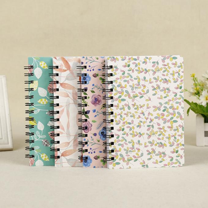 卸し売り注文のかわいいUnlinedペーパー立案者ジャーナル ハードカバーのポケット螺線形の小型ノート