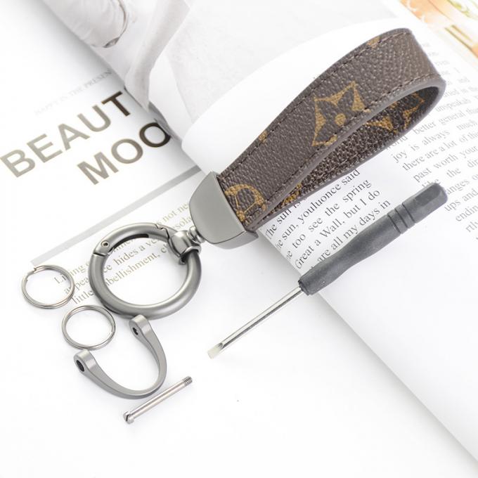 卸し売り革くま犬のKeychainの吊り下げ式袋は女性のための付属品のダイヤモンドくまKeychain Keychainsを飾る