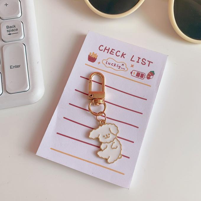 卸し売りウサギのKeychainの小さい花の金属の吊り下げ式袋は女性のための付属品のかわいい漫画Keychainsを飾る