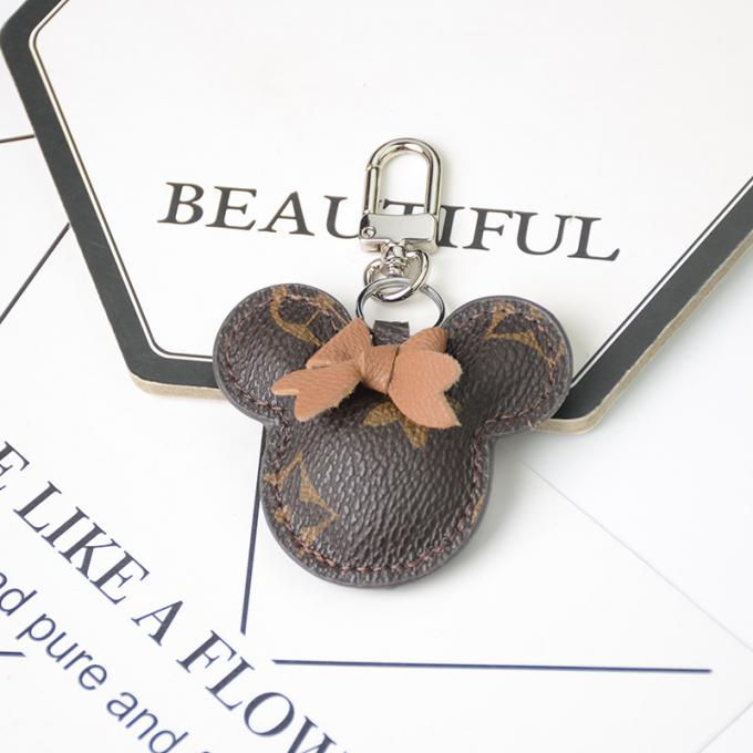 卸し売り革くま犬のKeychainの吊り下げ式袋は女性のための付属品のダイヤモンドくまKeychain Keychainsを飾る