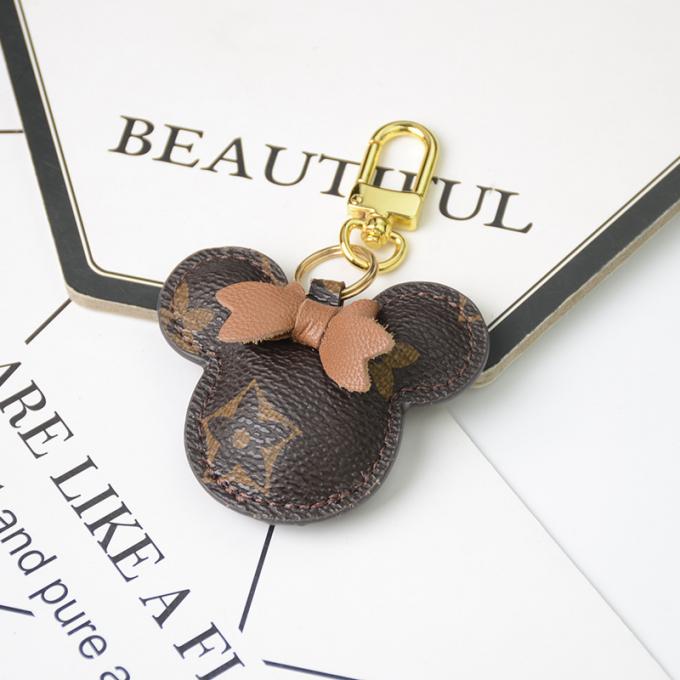 卸し売り革くま犬のKeychainの吊り下げ式袋は女性のための付属品のダイヤモンドくまKeychain Keychainsを飾る