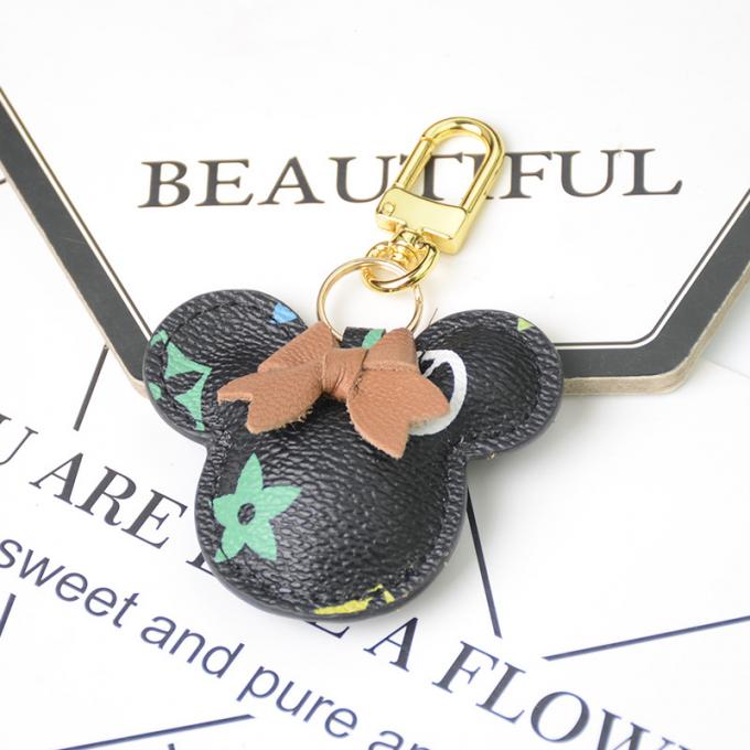 卸し売り革くま犬のKeychainの吊り下げ式袋は女性のための付属品のダイヤモンドくまKeychain Keychainsを飾る