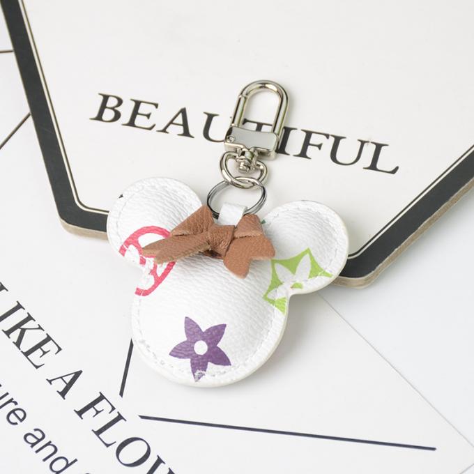 卸し売り革くま犬のKeychainの吊り下げ式袋は女性のための付属品のダイヤモンドくまKeychain Keychainsを飾る