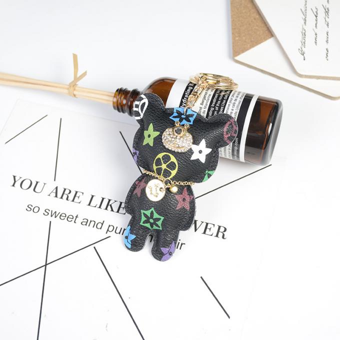 卸し売り革くま犬のKeychainの吊り下げ式袋は女性のための付属品のダイヤモンドくまKeychain Keychainsを飾る