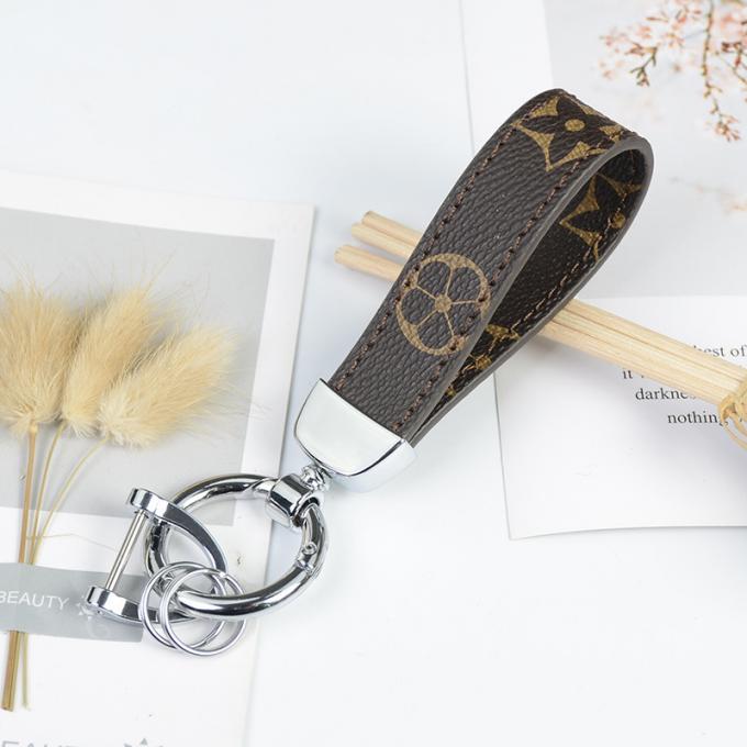 卸し売り革くま犬のKeychainの吊り下げ式袋は女性のための付属品のダイヤモンドくまKeychain Keychainsを飾る