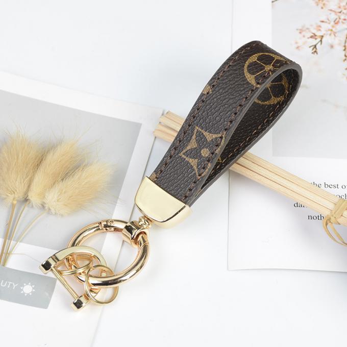 卸し売り革くま犬のKeychainの吊り下げ式袋は女性のための付属品のダイヤモンドくまKeychain Keychainsを飾る