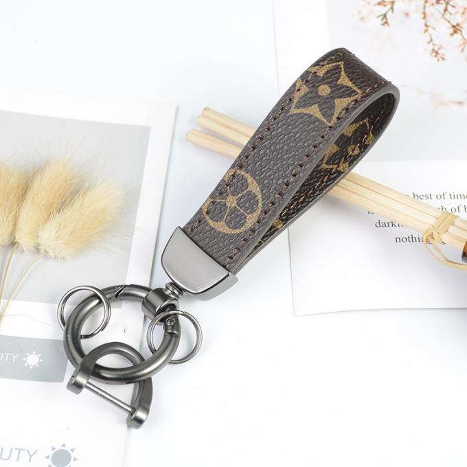 卸し売り革くま犬のKeychainの吊り下げ式袋は女性のための付属品のダイヤモンドくまKeychain Keychainsを飾る